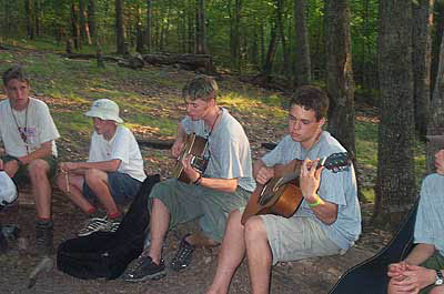 C - Nick and Mike play at the campfire